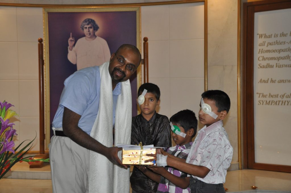 Global Outreach Dr. Ambati with Children